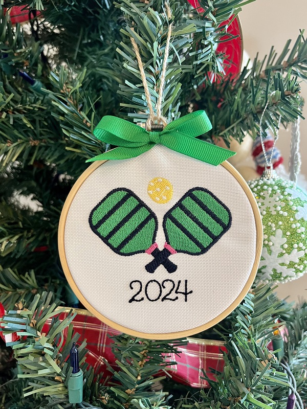 Embroidered Pickleball 2024 Ornament-4 inch wood hoop with design on a durable canvas finished with yellow grosgrain ribbon